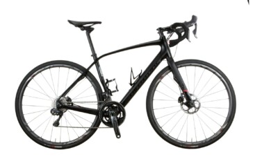 The young Aussie leading a Team BMC rider during a day race in Holland.